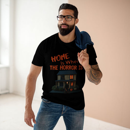 Home Is Where The Horror Is unisex slasher house T-shirt with bold horror movie inspired graphic. Boutique gothic tee for fans of haunted houses and slasher aesthetics.