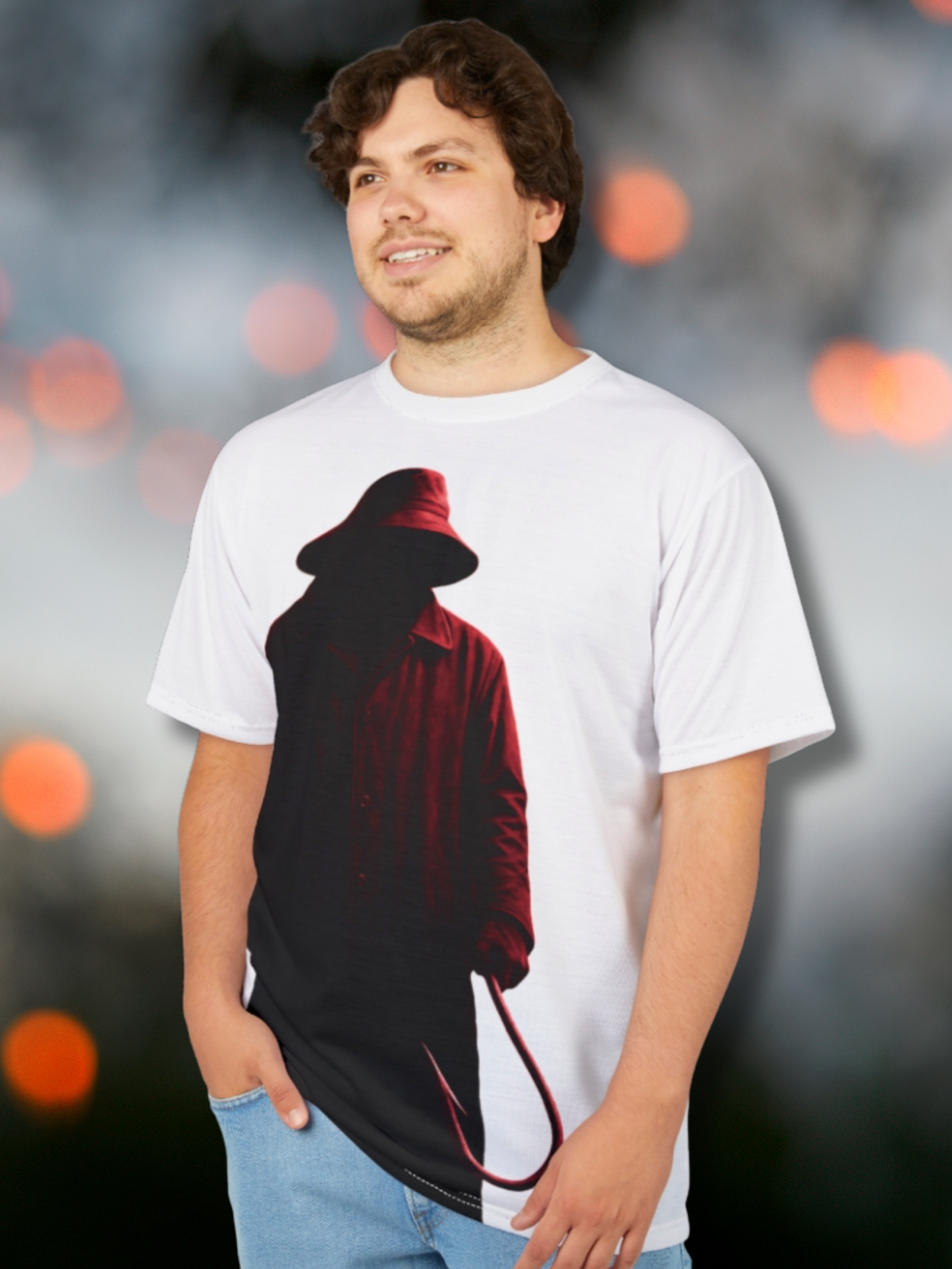 Unisex horror graphic t-shirt featuring a forgotten slasher design of a shadowy figure in a red coat and wide-brim hat holding a hook, printed on a white tee. Boutique streetwear style with eerie, vintage-inspired horror fashion.
