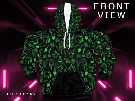 Green and black all-over print unisex pullover hoodie featuring occult cat with third eye, pentagrams, potions, and tarot card motifs. Displayed front view against a dark background with neon pink lights. Invaluable Minutia exclusive.