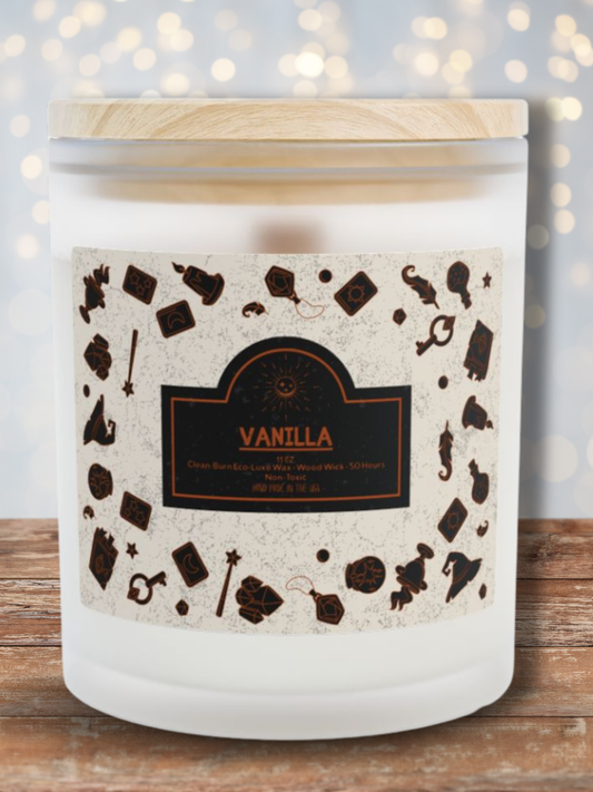 Vanilla frosted glass wood wick candle with eco luxe clean-burn wax, wooden lid, and decorative Halloween-style label. Premium hand-poured candle by Invaluable Minutia.