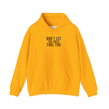Don't Let the Smile Fool You. Gildan Unisex Hoodie