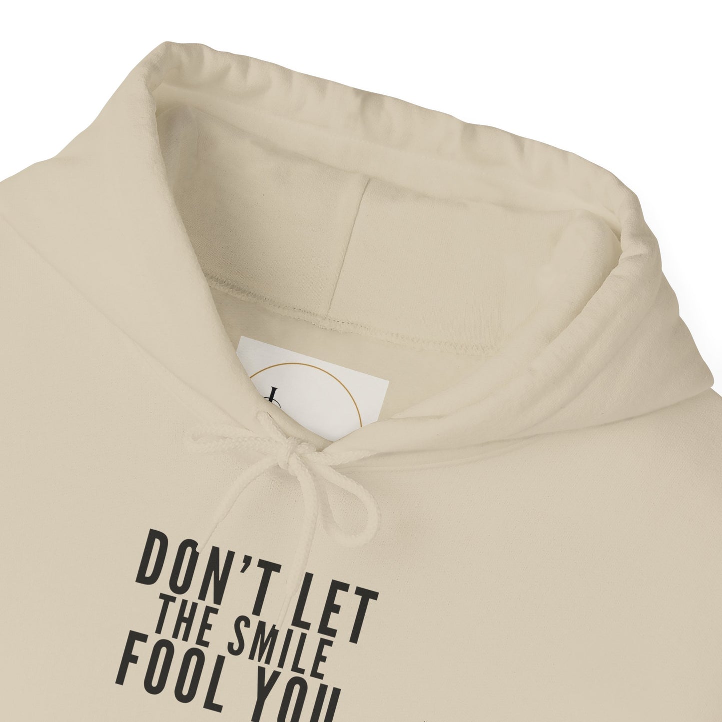 Don't Let the Smile Fool You. Gildan Unisex Hoodie