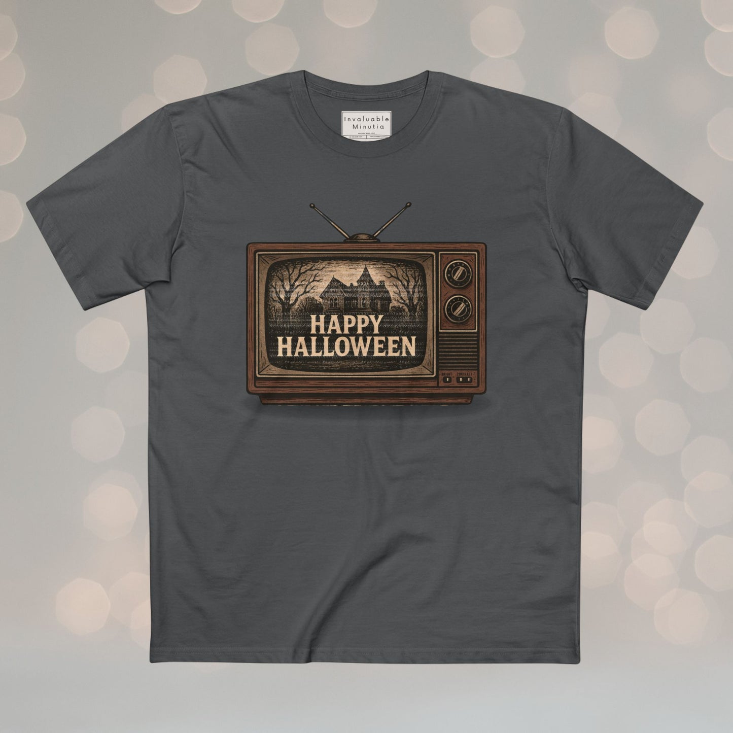 Retro TV Happy Halloween vintage unisex T-shirt with illustrated gothic horror design. Premium AS Colour tee with nostalgic Halloween vibe. Boutique spooky fashion by Invaluable Minutia.