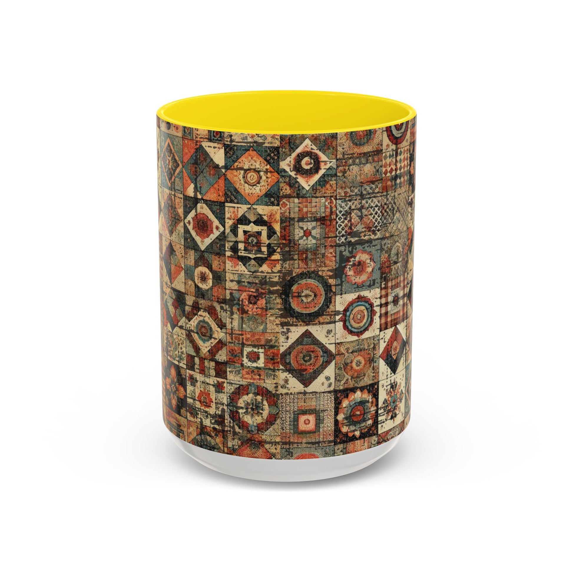 Front view of 15oz Boho Patchwork Quilt ceramic coffee mug with yellow accent handle and interior — premium white ceramic mug featuring intricate patchwork quilt-inspired geometric art design. Boutique accent mug by Invaluable Minutia. InvaluableMinutia.com