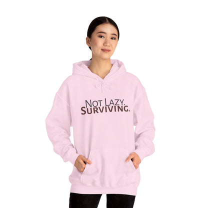 Not lazy. Surviving. Gildan Unisex Hoodie