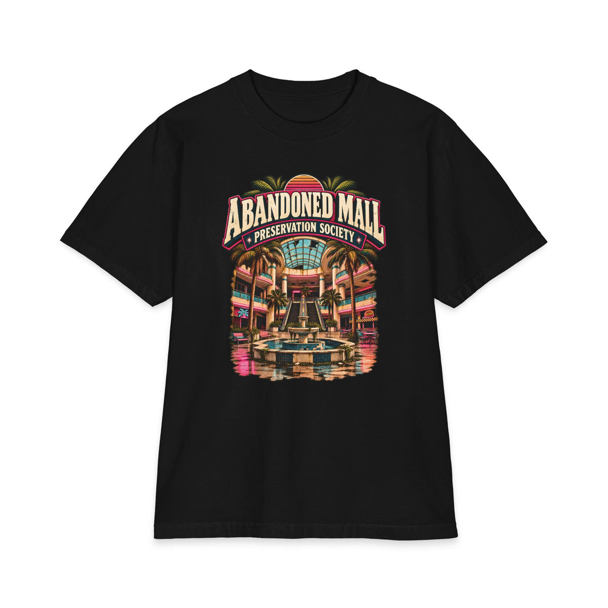 Close-up of a black Shaka Wear heavyweight T-shirt with Abandoned Mall Preservation Society artwork.