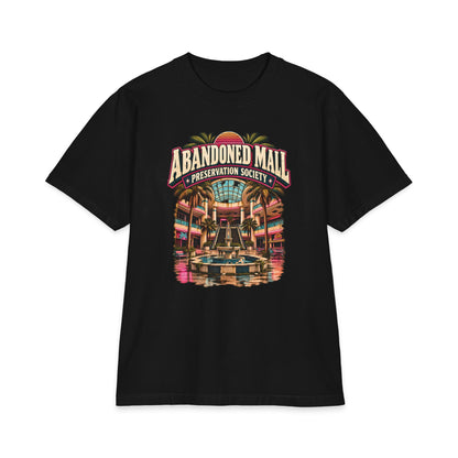 Close-up of a black Shaka Wear heavyweight T-shirt with Abandoned Mall Preservation Society artwork.