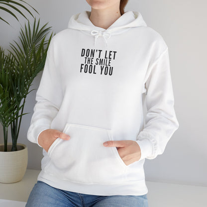 Don't Let the Smile Fool You. Gildan Unisex Hoodie