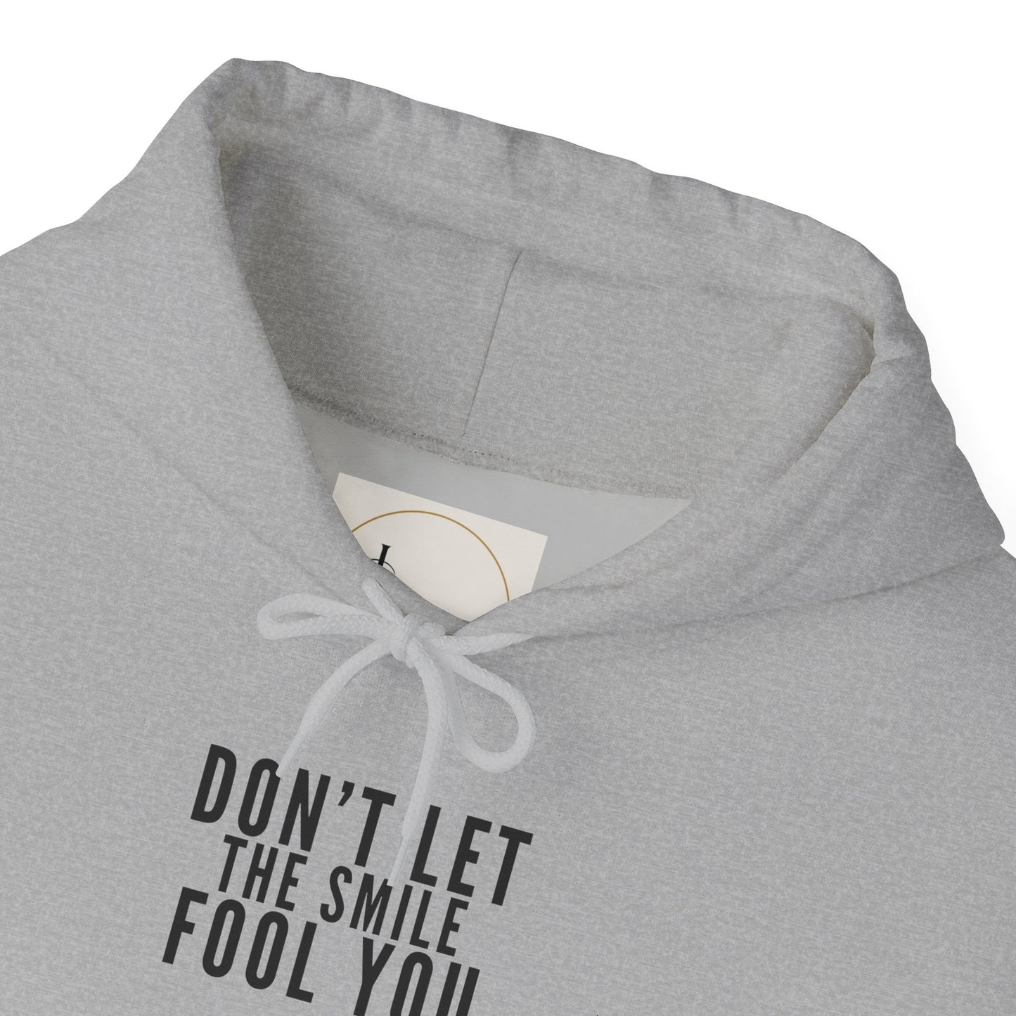 Don't Let the Smile Fool You. Gildan Unisex Hoodie