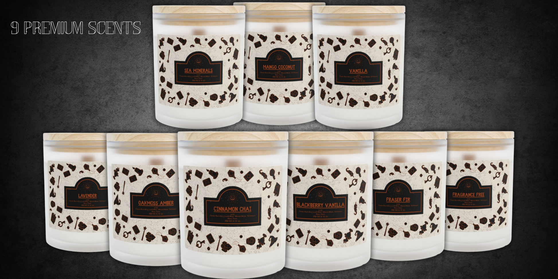 Collection of nine frosted glass wood wick candles with eco luxe clean-burn wax and wooden lids, featuring Halloween-style labels. Scents include Sea Minerals, Mango Coconut, Vanilla, Lavender, Oakmoss Amber, Cinnamon Chai, Blackberry Vanilla, Fraser Fir, and Fragrance Free.