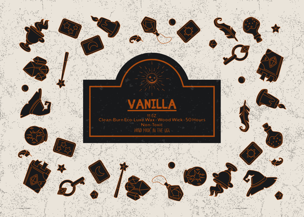 Close-up of Vanilla candle label featuring Halloween-style orange and black icons including witch hats, potion bottles, and crystals. Eco luxe clean-burn wood wick candle, Invaluable Minutia exclusive.