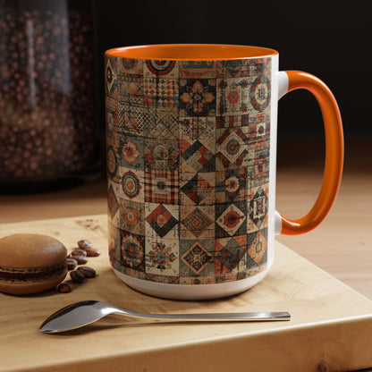 Right-side lifestyle view of 15oz Boho Patchwork Quilt ceramic coffee mug with orange accent handle and interior — premium white ceramic mug featuring intricate patchwork quilt pattern in rustic boho tones. Displayed on a wooden surface with coffee beans, macaron, and spoon. Boutique mug by Invaluable Minutia. InvaluableMinutia.com